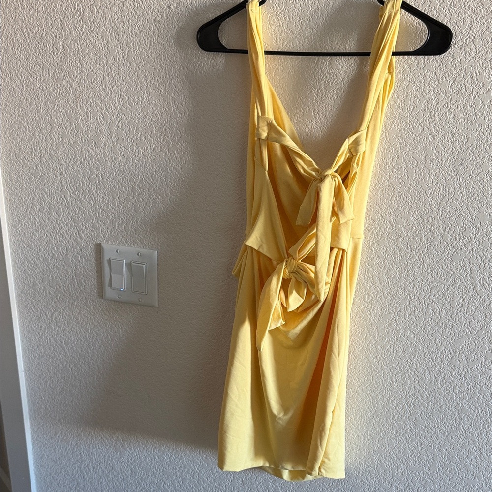 Yellow Sleeveless Dress with Bow Detail